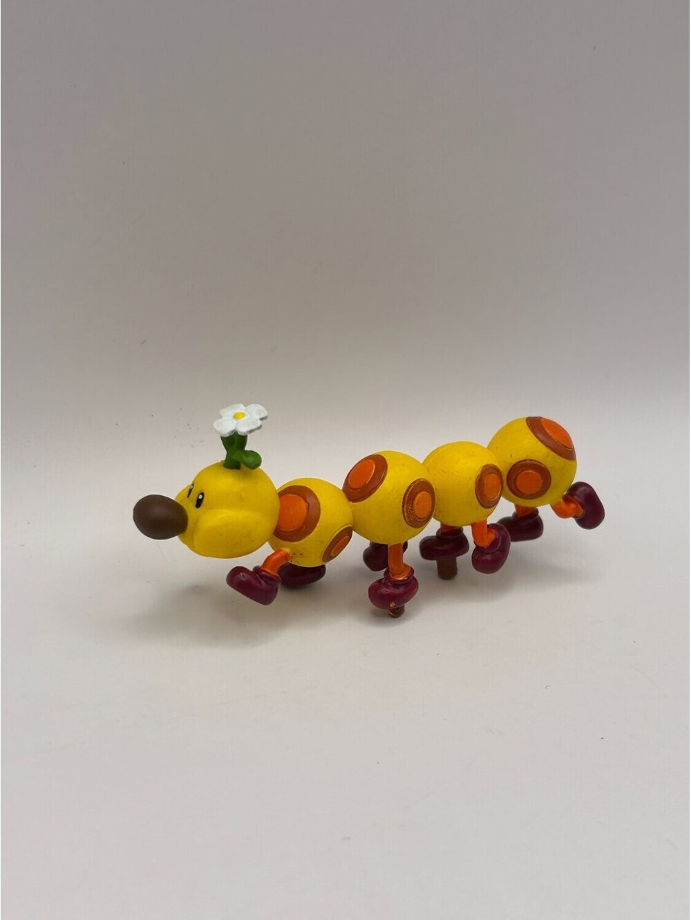 Nintendo Super Mario Wiggler caterpillar figure Yellow flower on head brown nose